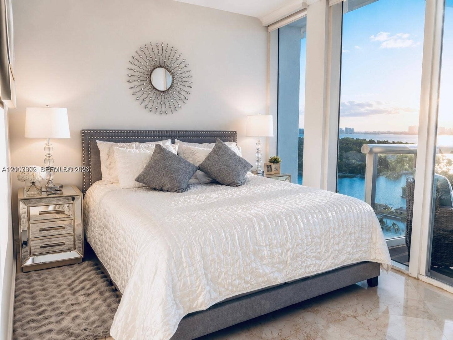 6515 Collins Avenue, #1609, Miami Beach, Miami Beach, FL 33141 Floor-to-ceiling windows featuring expansive water scenery, neutral wall finishes, and polished tile flooring