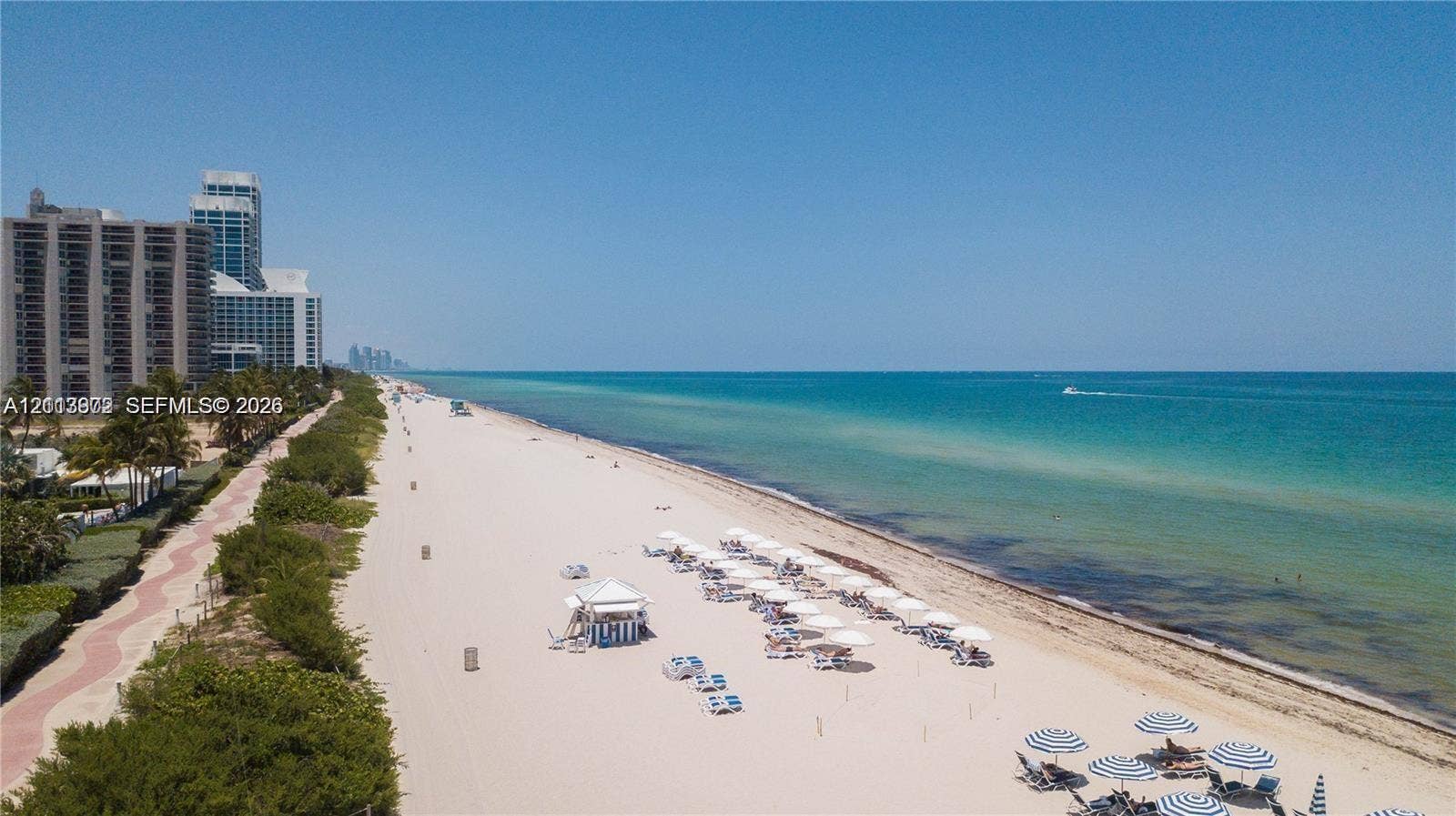 6515 Collins Avenue, #1609, Miami Beach, Miami Beach, FL 33141 Coastal stretch featuring expansive sand beach, paved shoreline pathway, and direct oceanfront access