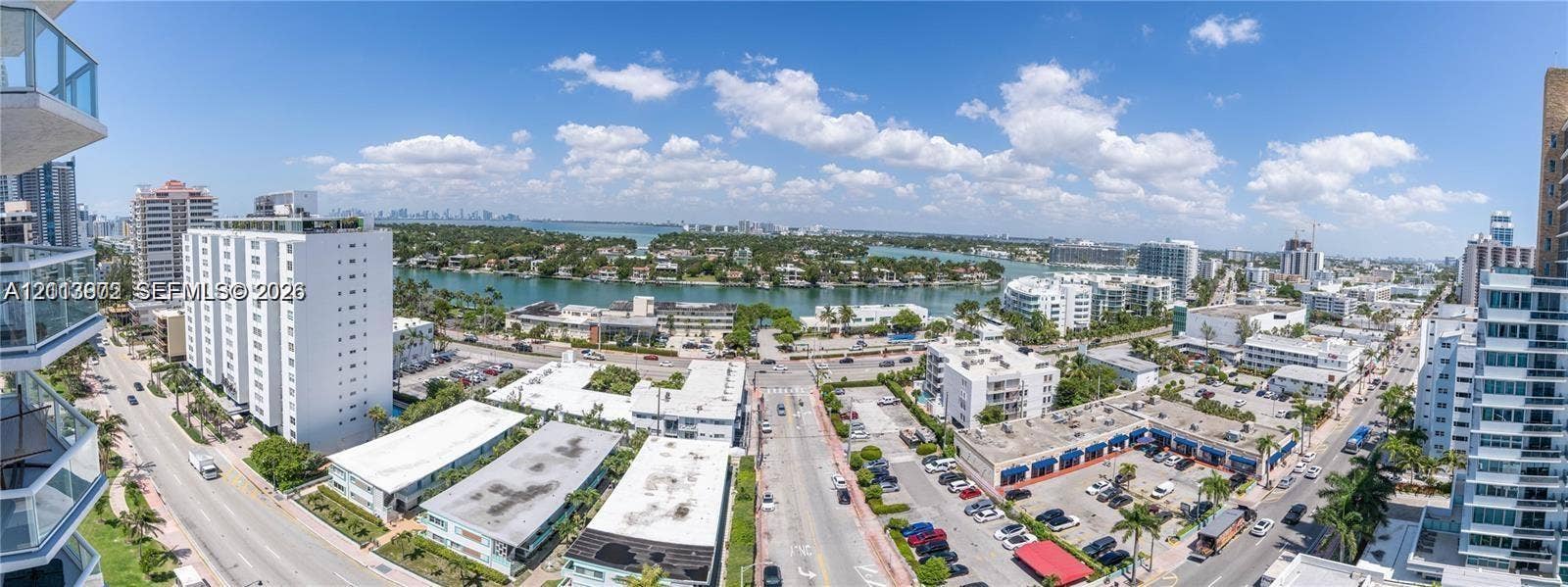 6515 Collins Avenue, #1609, Miami Beach, Miami Beach, FL 33141 High-rise exterior with glass balcony railings, panoramic urban surroundings, and direct exposure to coastal waterways