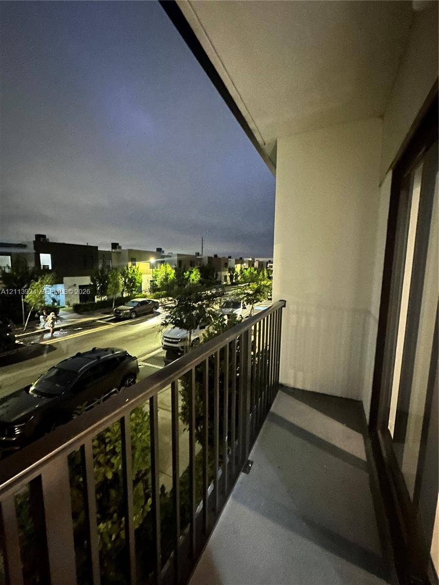 14569 SW 261st Terrace, #14569, Homestead, Homestead, FL 33032 Private balcony with metal railings and concrete flooring