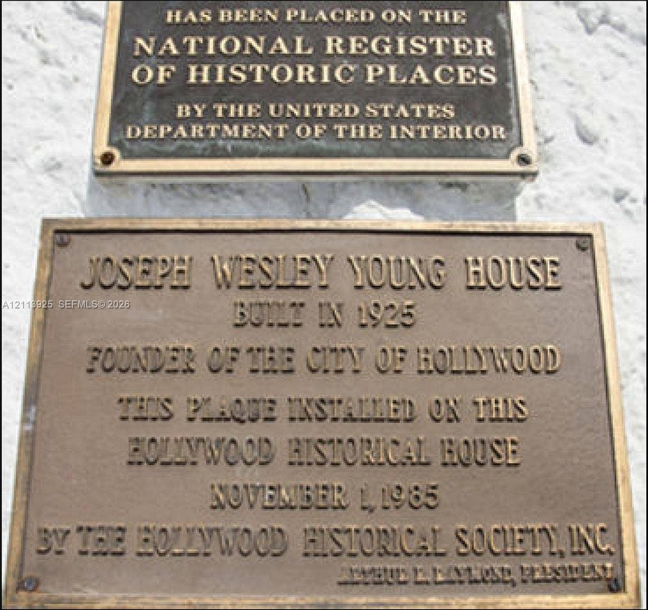 1055 Hollywood Boulevard, Hollywood, Hollywood, FL 33019 Bronze historical plaques recognizing the property as a site on the National Register of Historic Places and a documented historical residence built in 1925