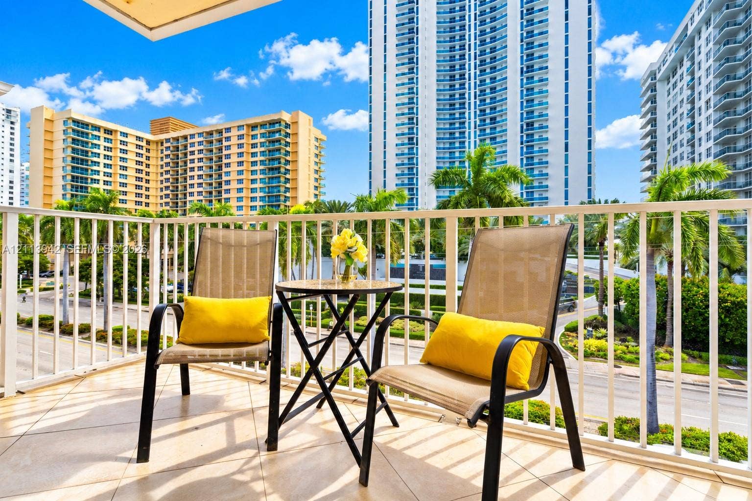 2710 S Ocean Drive, #401, Hollywood, FL 33019 Private balcony featuring neutral ceramic tile flooring and a white metal safety railing
