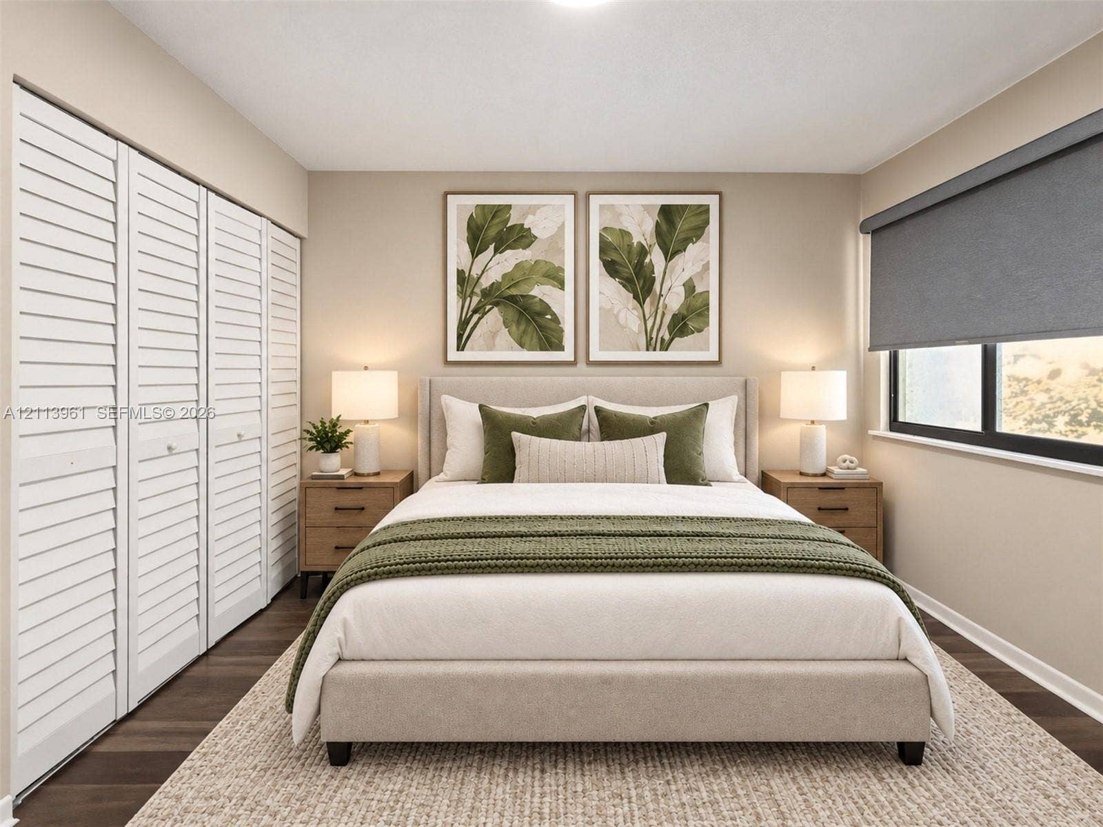 339 City View Drive, #339, Fort Lauderdale, Fort Lauderdale, FL 33311 Room featuring white louvered closet doors, dark wood-finish flooring, and a window equipped with a retractable roller shade
