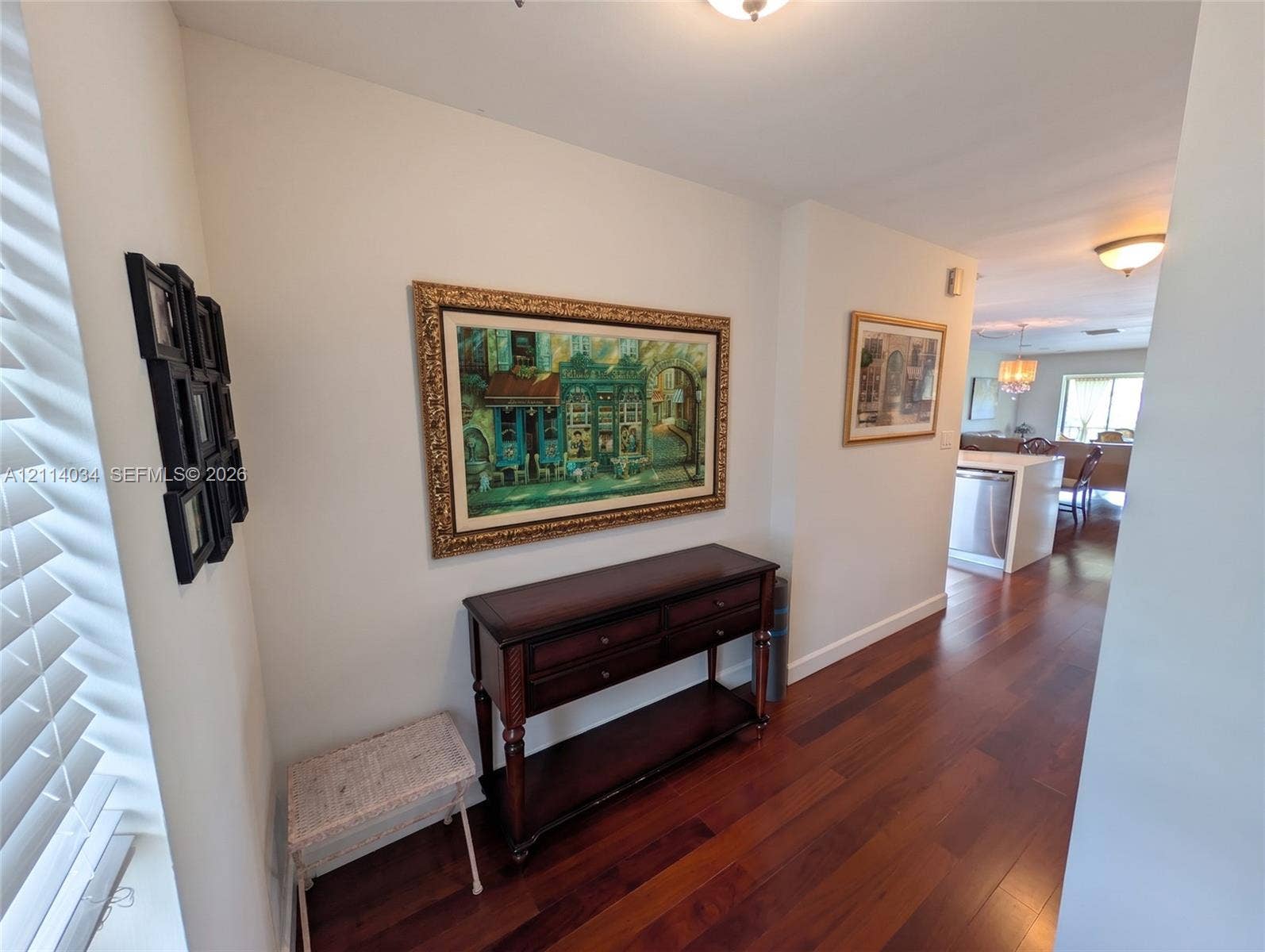 8460 Casa Del Lago, #H, Boca Raton, Boca Raton, FL 33433 Entry area featuring wood-finish flooring, white walls, and flush-mount ceiling lighting