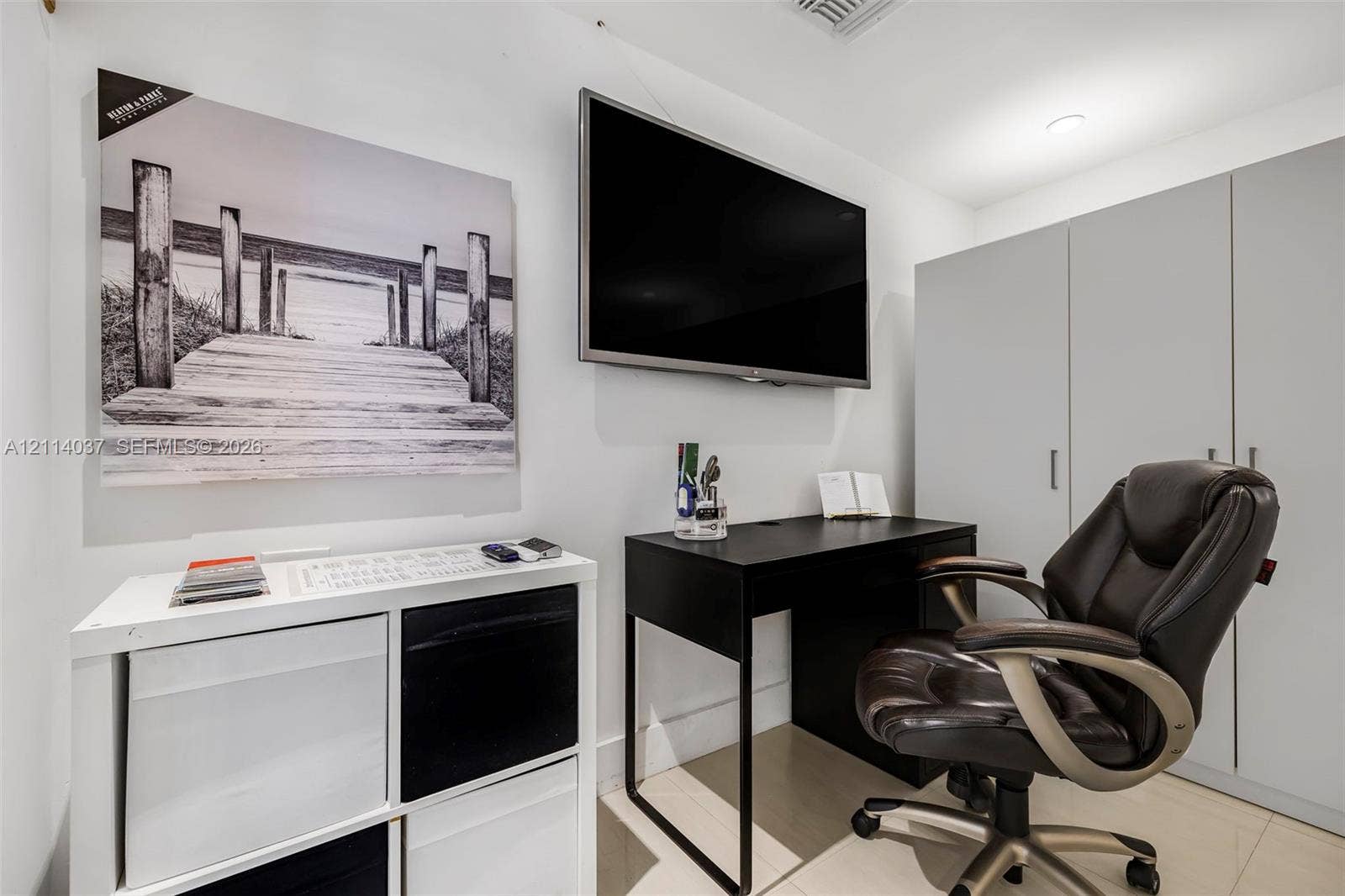 8436 SW 143rd Avenue, Miami, FL 33183 Built-in full-height storage cabinetry, recessed lighting, and tile flooring