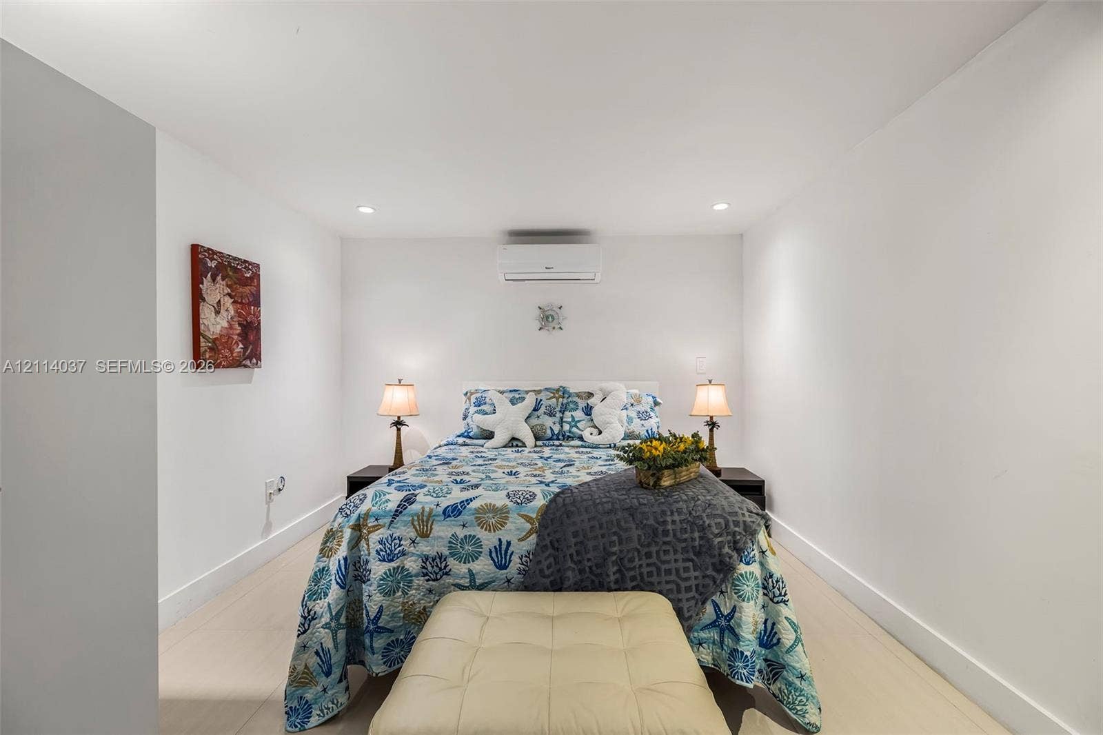 8436 SW 143rd Avenue, Miami, FL 33183 Neutral interior featuring light-toned flooring, recessed lighting, and a wall-mounted ductless climate control unit