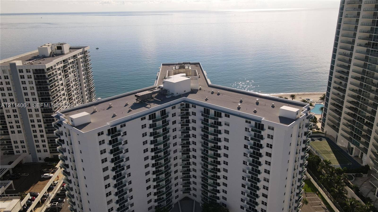 3001 S Ocean Drive, #727, Hollywood, FL 33019 High-rise residential building featuring white exterior cladding, a multi-wing structural design, and private balconies with glass railings