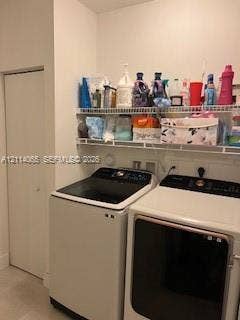 Laundry area featuring dual-tier white wire shelving and a floor-to-ceiling bi-fold door closet