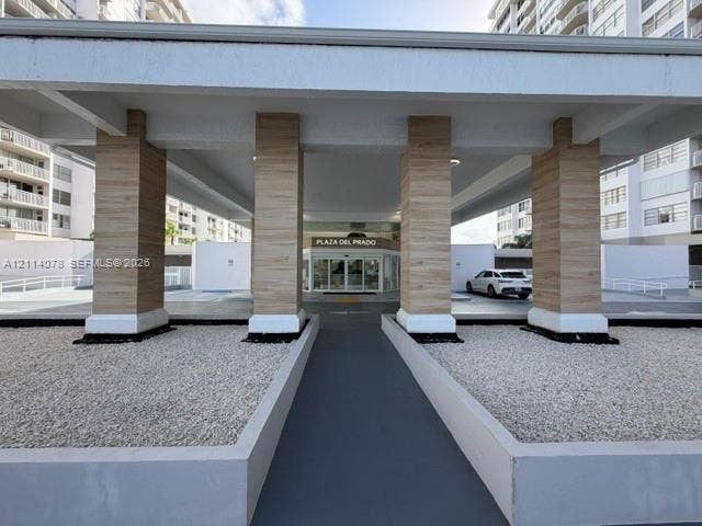 entrance way with security and video screen