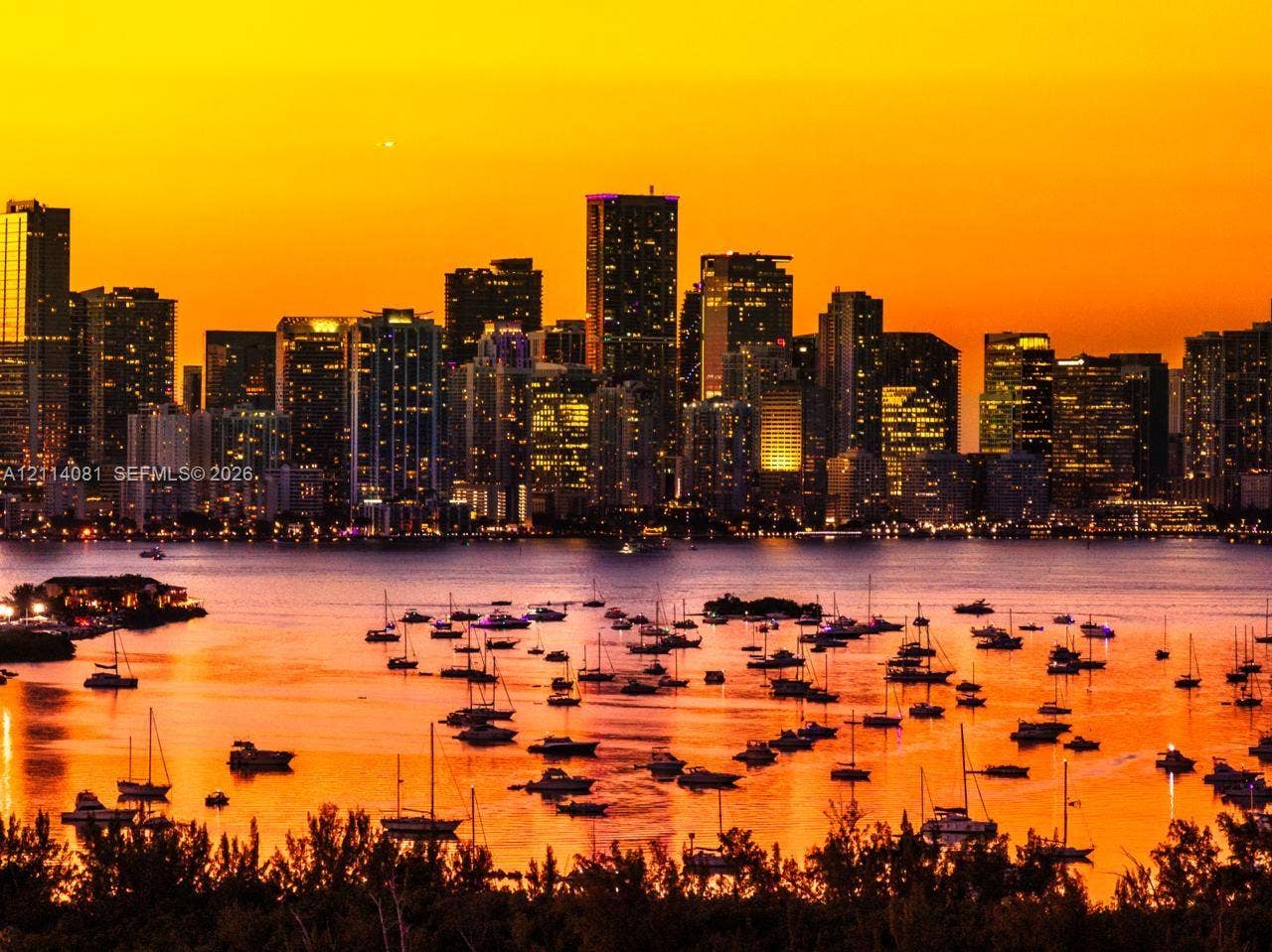 185 SW 7th Street, #3609, Miami, Miami, FL 33130 Panoramic skyline backdrop featuring a coastal waterway and anchored sailboats