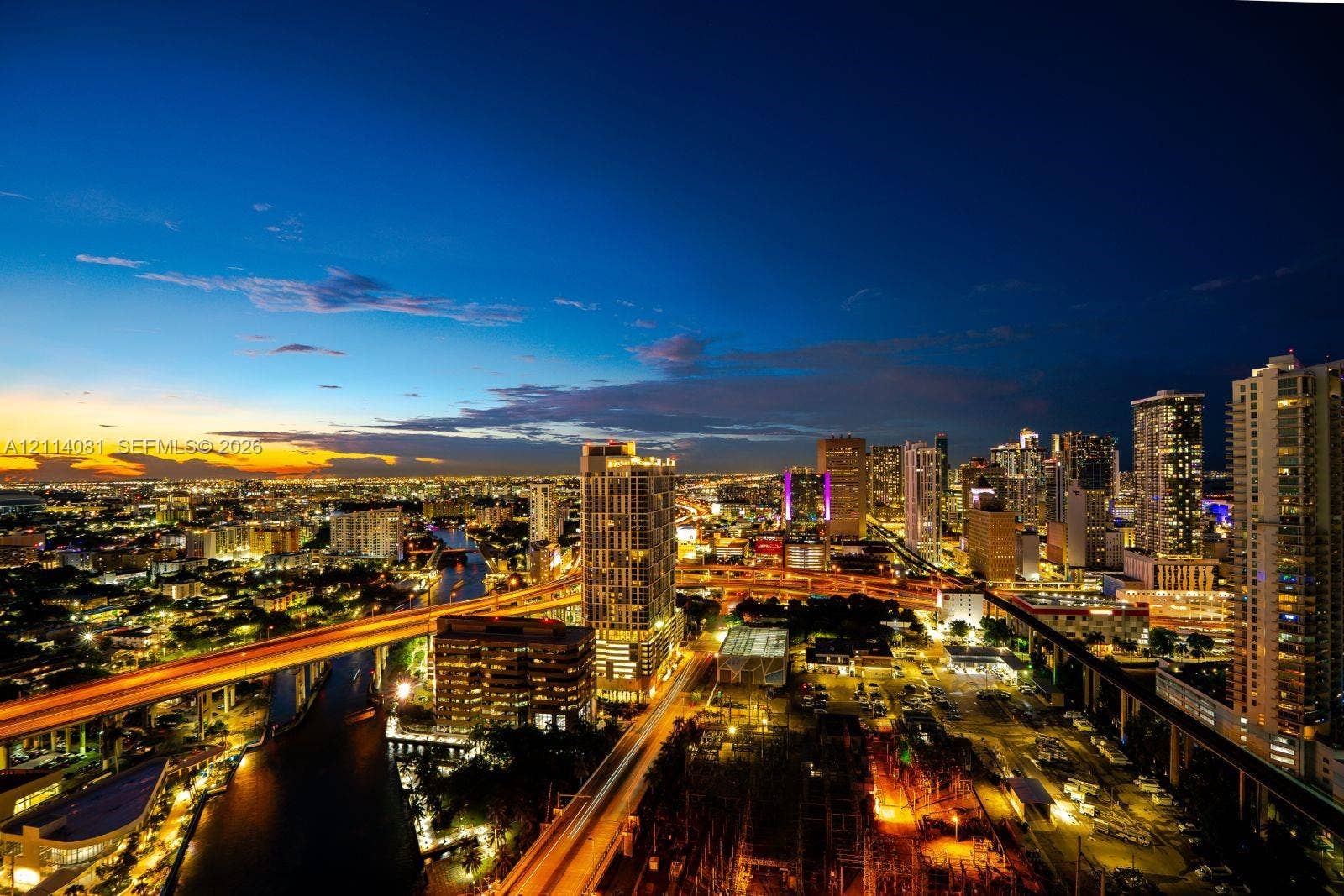 185 SW 7th Street, #3609, Miami, Miami, FL 33130 High-elevation urban skyline featuring extensive cityscape illumination and prominent metropolitan architecture