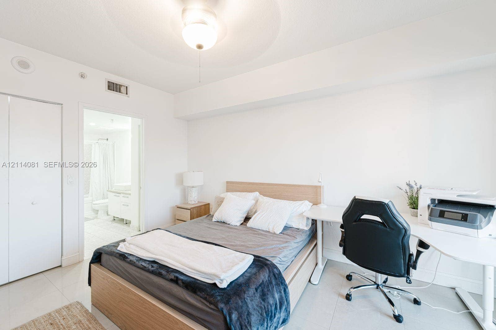 185 SW 7th Street, #3609, Miami, Miami, FL 33130 Neutral wall tones, polished tile flooring, and a flush-mount ceiling light fixture