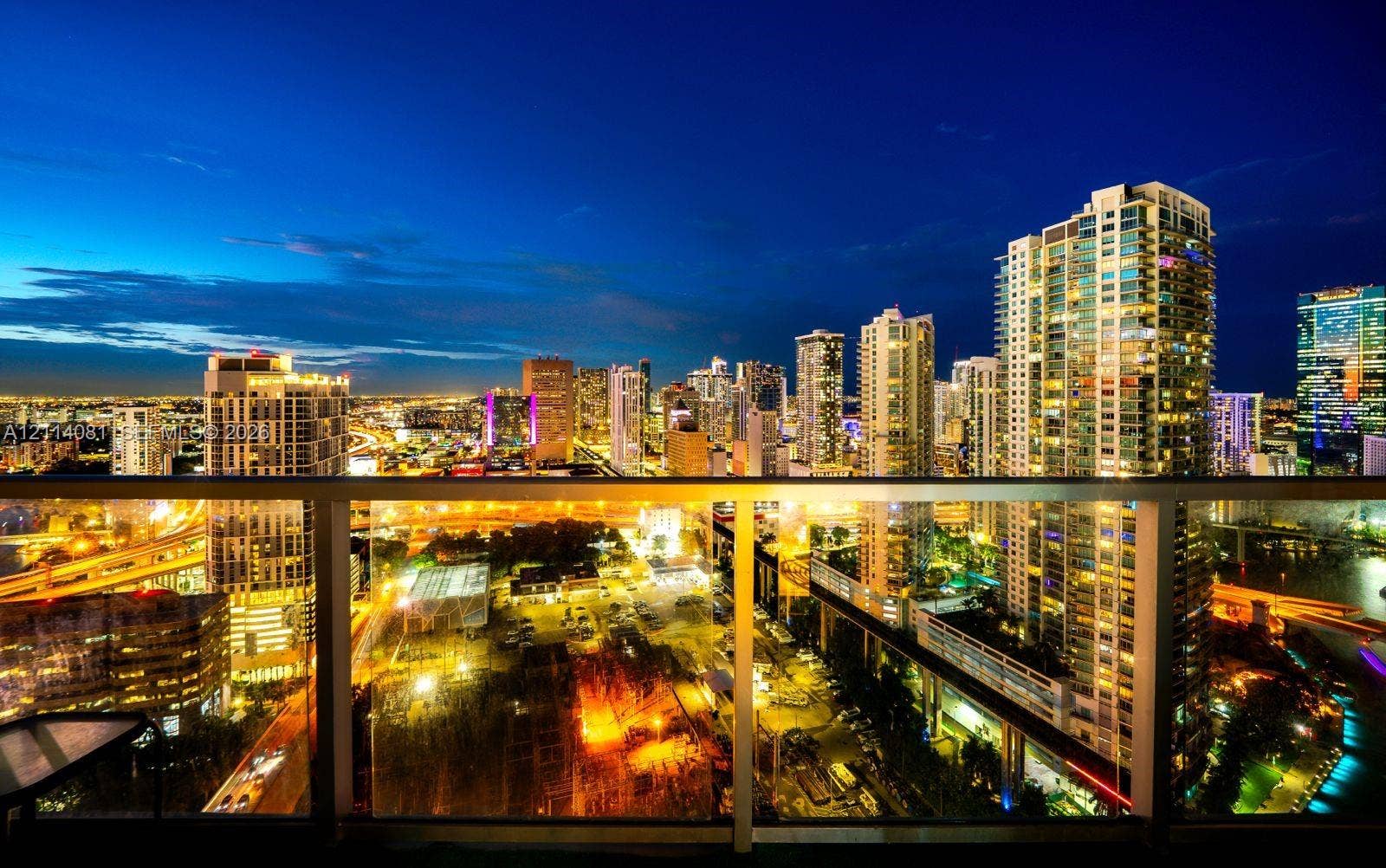 185 SW 7th Street, #3609, Miami, Miami, FL 33130 Private balcony featuring a glass panel railing and panoramic urban skyline scenery