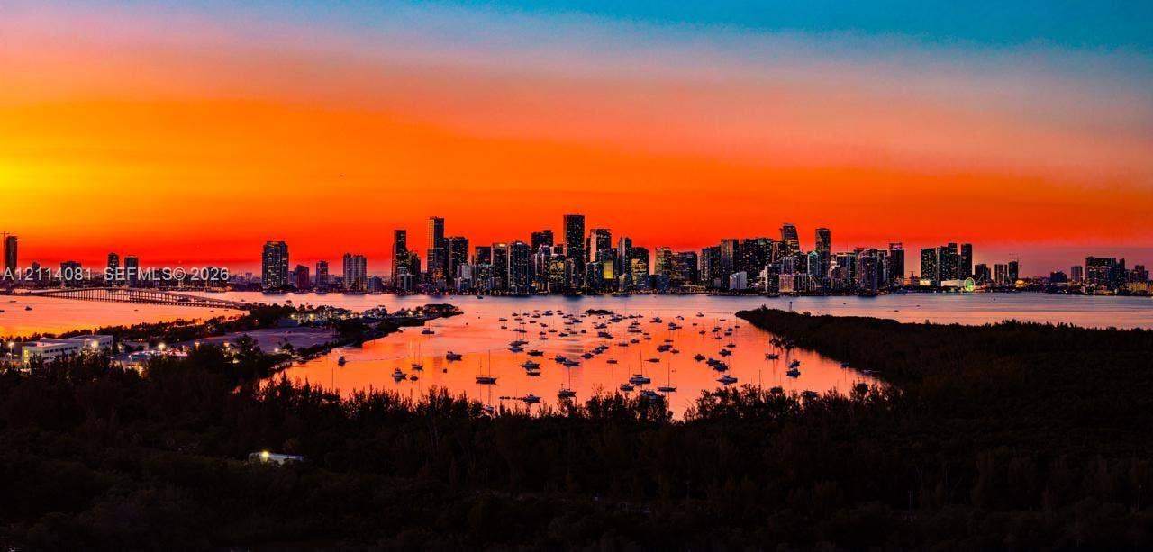 185 SW 7th Street, #3609, Miami, Miami, FL 33130 Panoramic city skyline horizon, expansive waterfront, and vibrant sunset backdrop