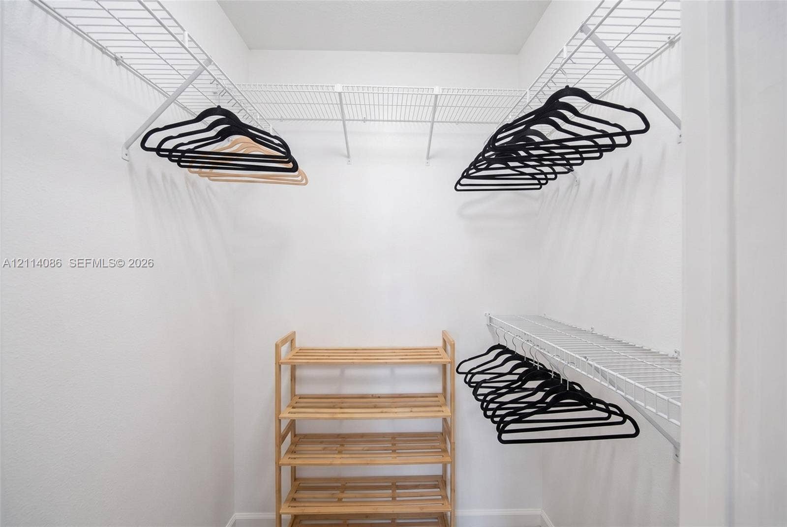 706 NW 87th Avenue, #204, Miami, Miami, FL 33172 Walk-in closet featuring tiered white wire shelving