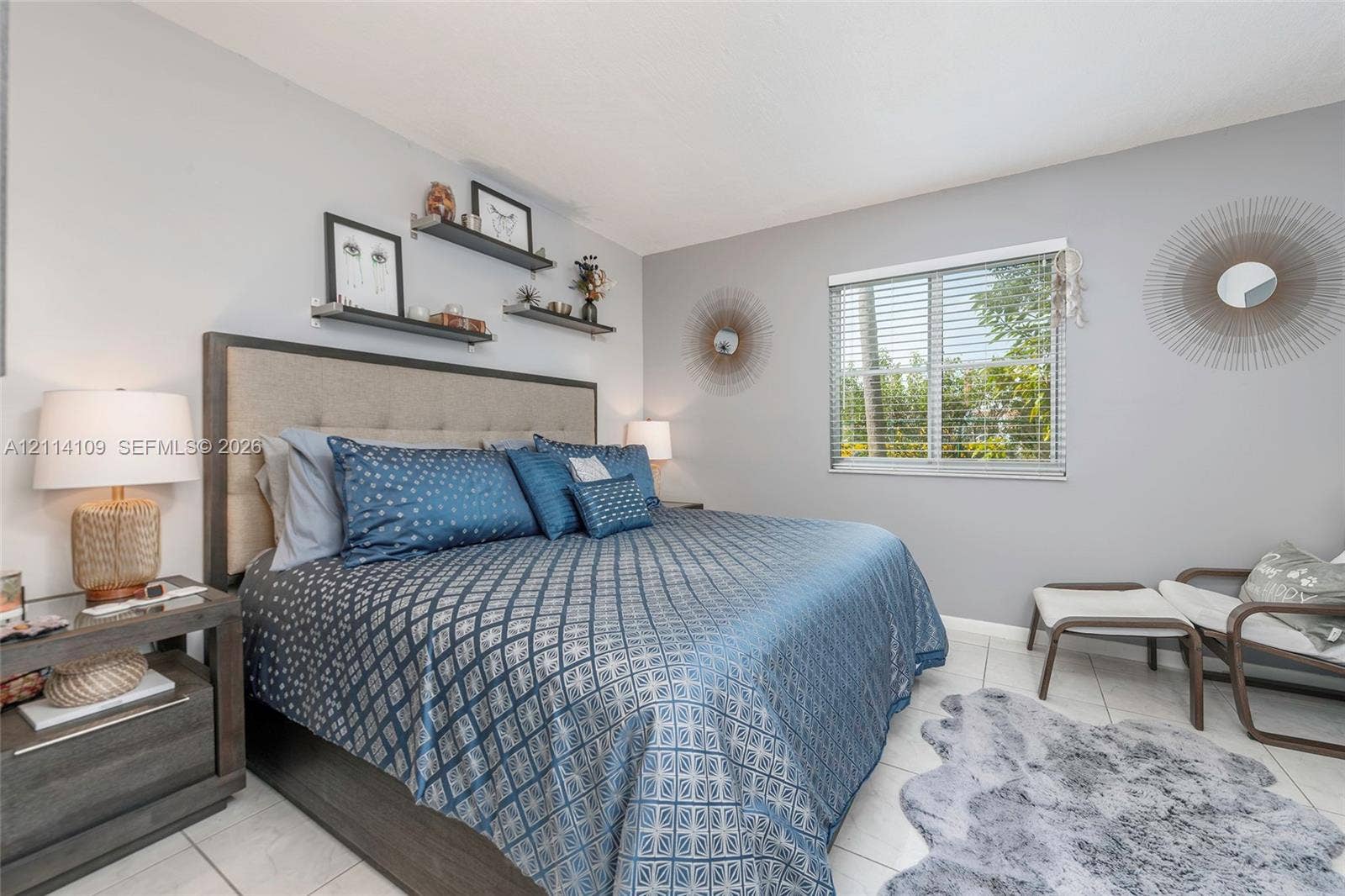 15761 SW 137th Avenue, #104, Miami, Miami, FL 33177 Bedroom featuring neutral wall paint, tile flooring, and a sliding window with horizontal blinds