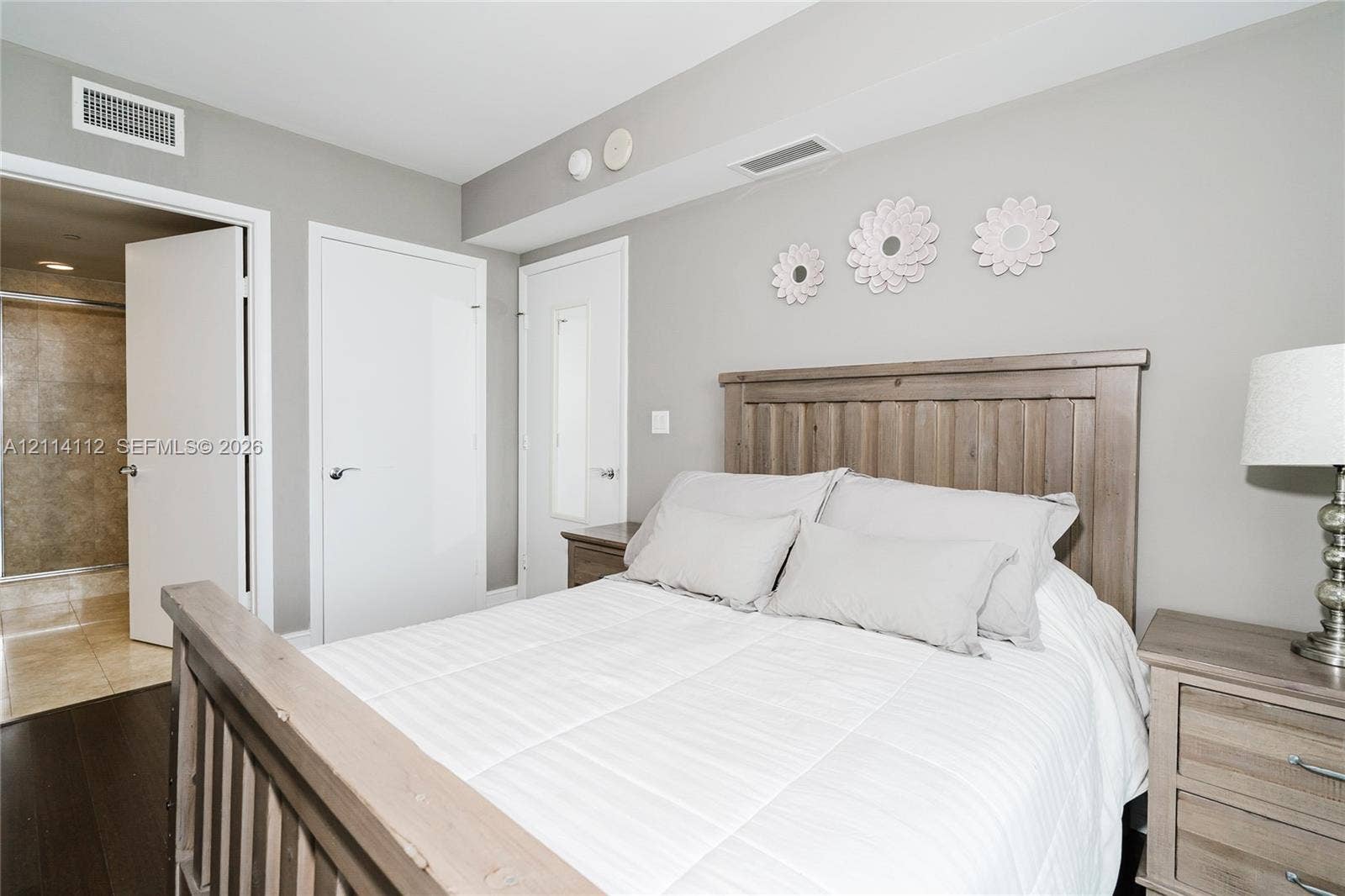 1850 S Ocean Drive, #4008, Hallandale Beach, FL 33009 Neutral wall paint, wood-finish flooring, and solid-core interior doors