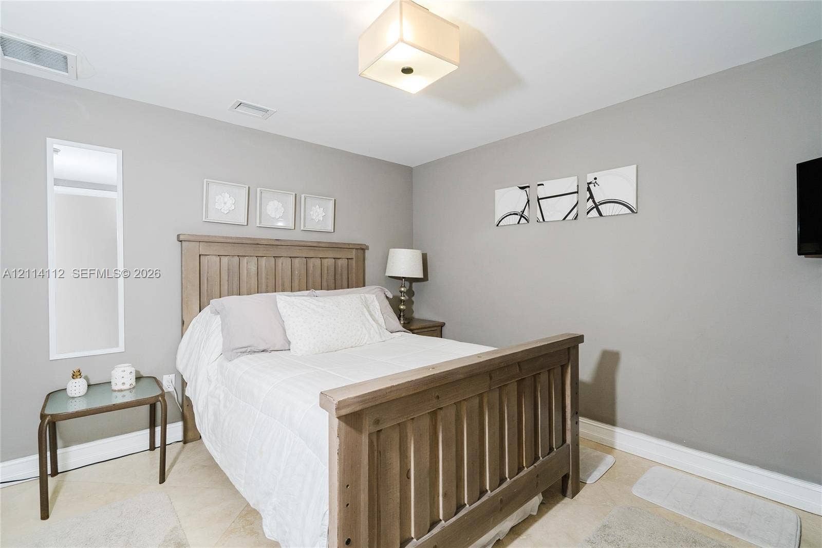 1850 S Ocean Drive, #4008, Hallandale Beach, FL 33009 Neutral-toned walls paired with light-colored tile flooring and a square flush-mount ceiling fixture