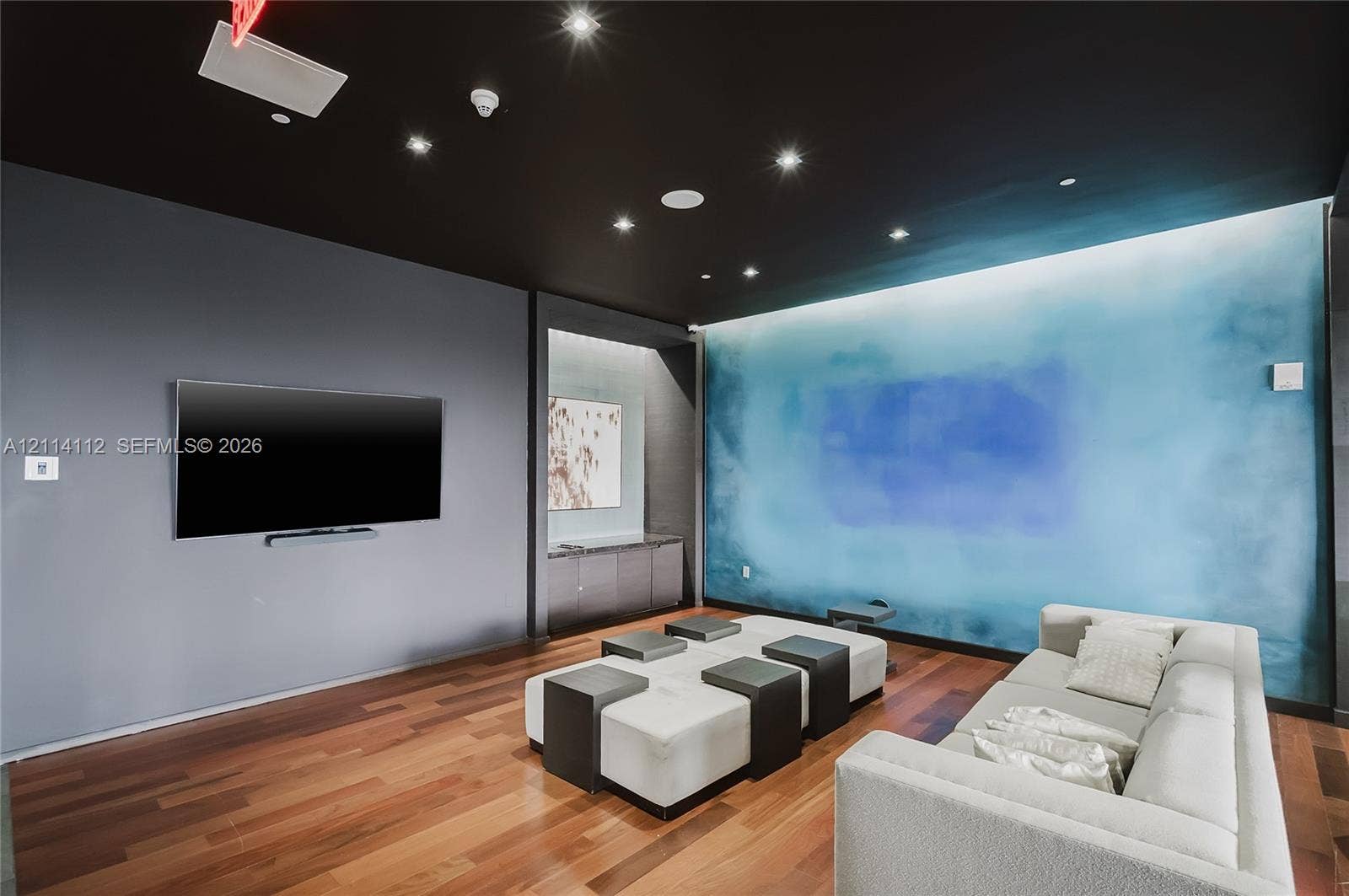 1850 S Ocean Drive, #4008, Hallandale Beach, FL 33009 Wood-finish flooring, recessed ceiling lighting, built-in cabinetry, and integrated wall-mounted technology
