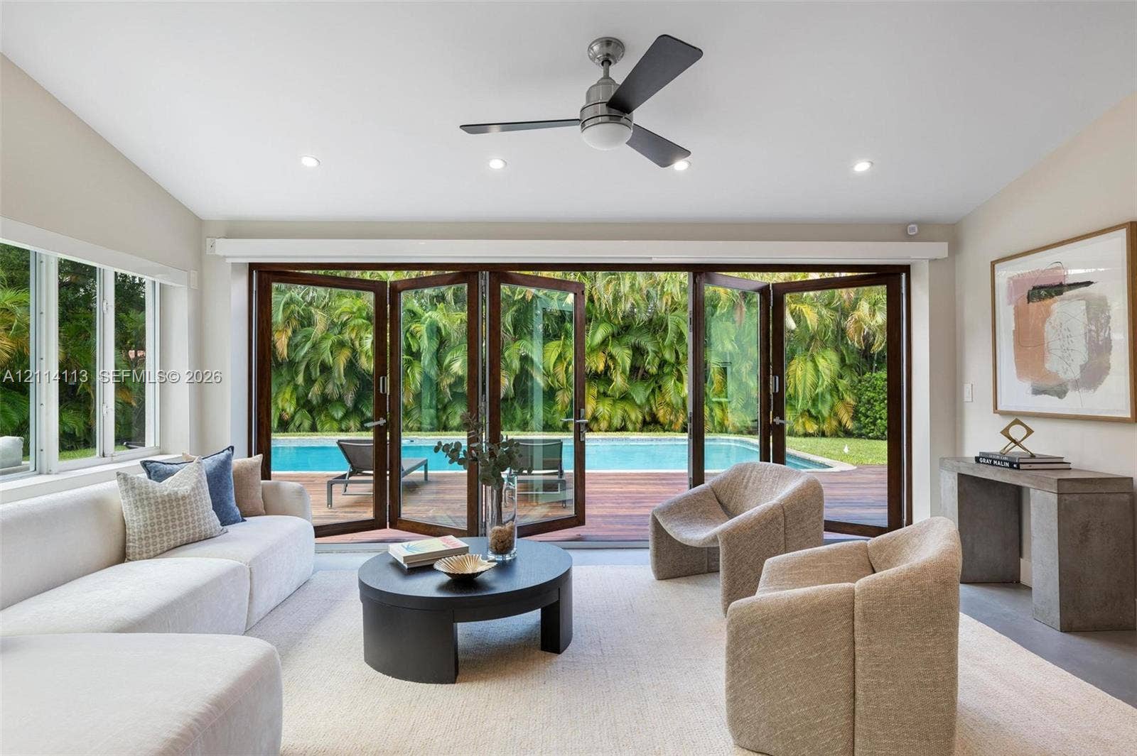 5386 Alton Road, Miami Beach, FL 33140 Multi-panel bi-folding glass doors, recessed lighting, ceiling fan