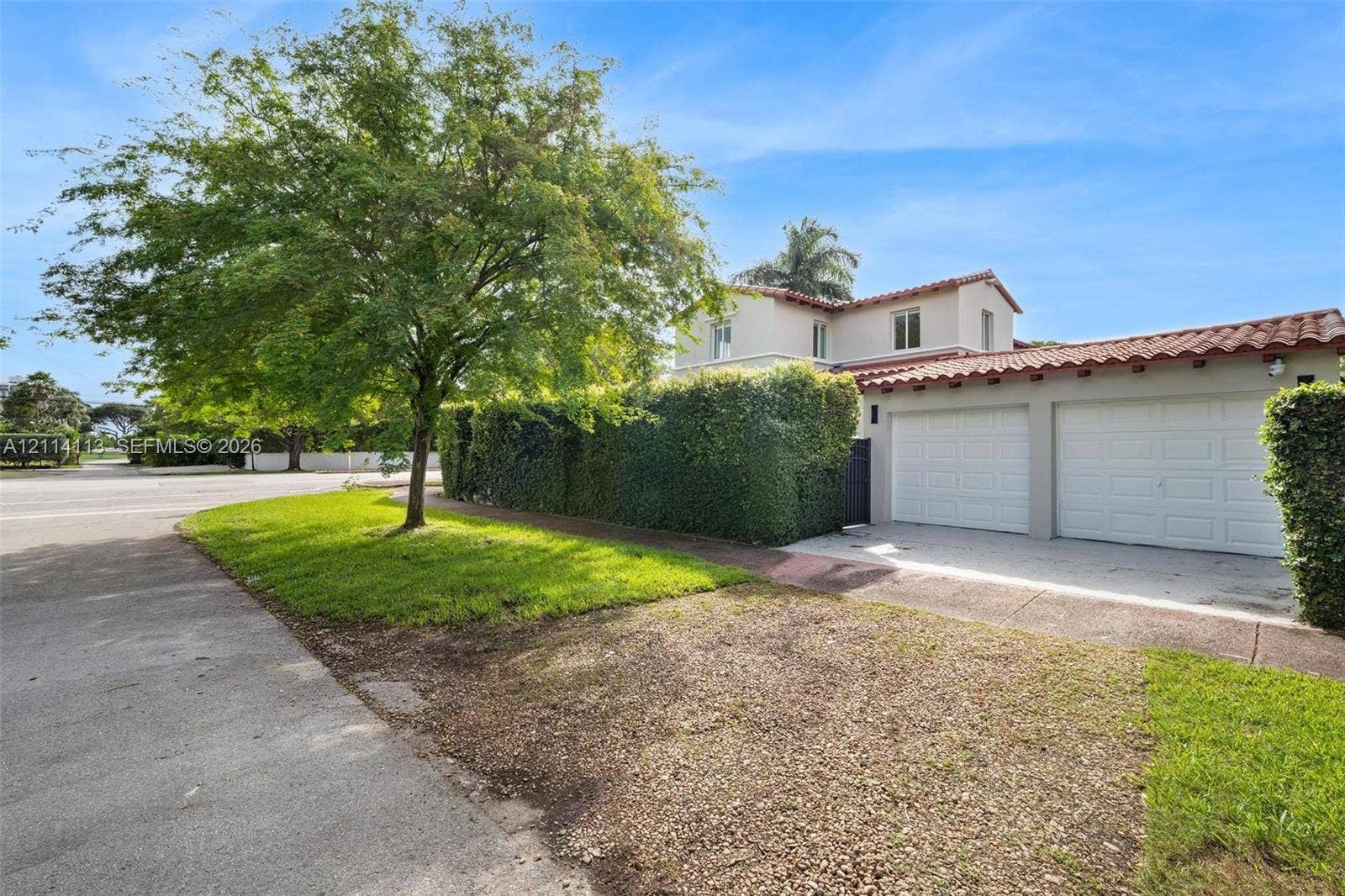 5386 Alton Road, Miami Beach, FL 33140 Double car garage opening on W 54th st