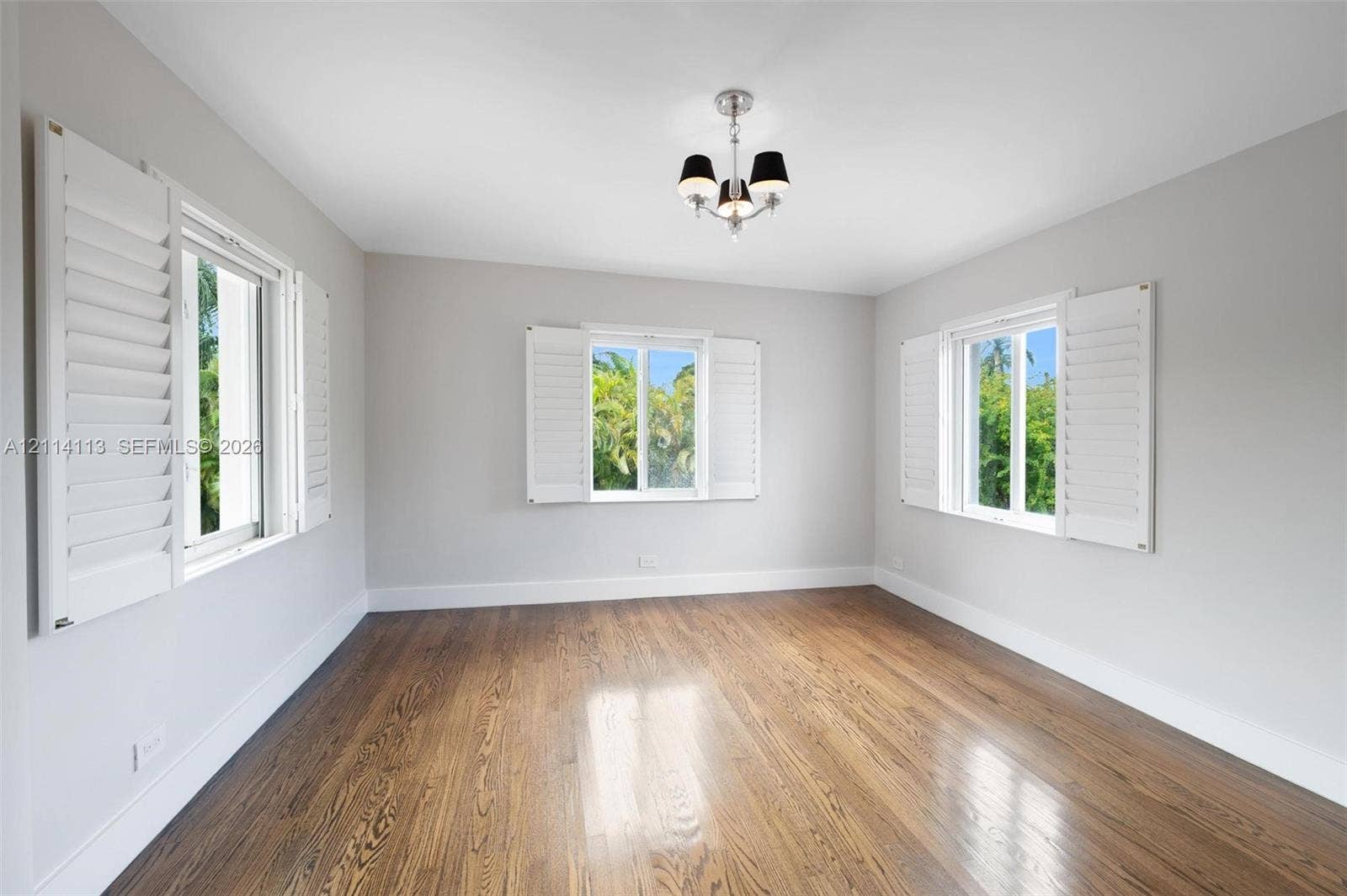 5386 Alton Road, Miami Beach, FL 33140 Wood-finish flooring, three windows with interior