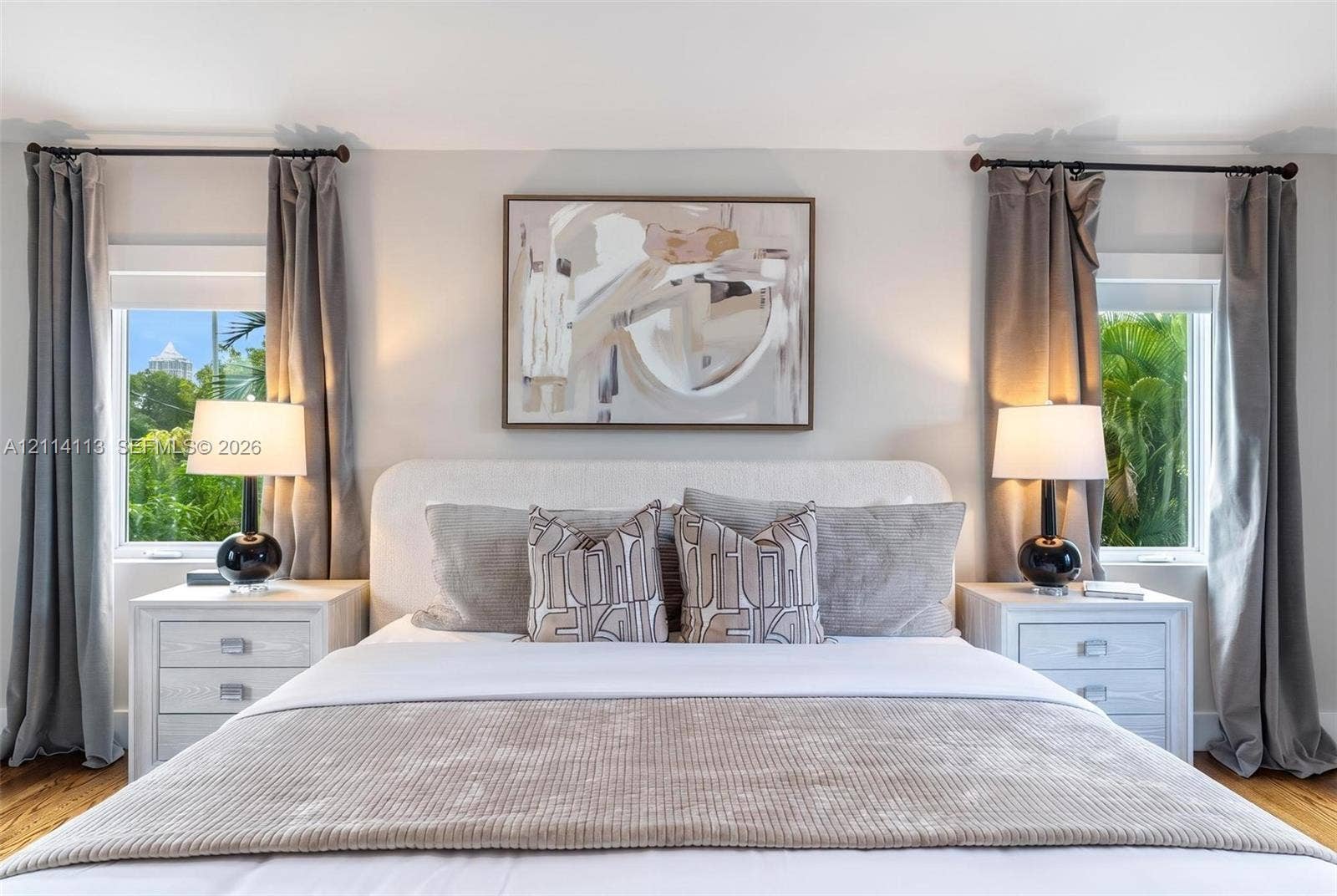 5386 Alton Road, Miami Beach, FL 33140 Filled with natural light and greenery, Symmetrical windows, natural wood flooring