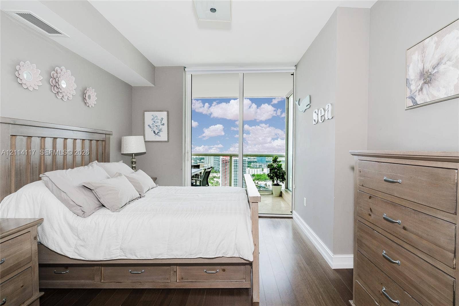 1850 S Ocean Drive, #4008, Hallandale Beach, Hallandale Beach, FL 33009 Wood-finish flooring, full-height sliding glass doors, and a private balcony