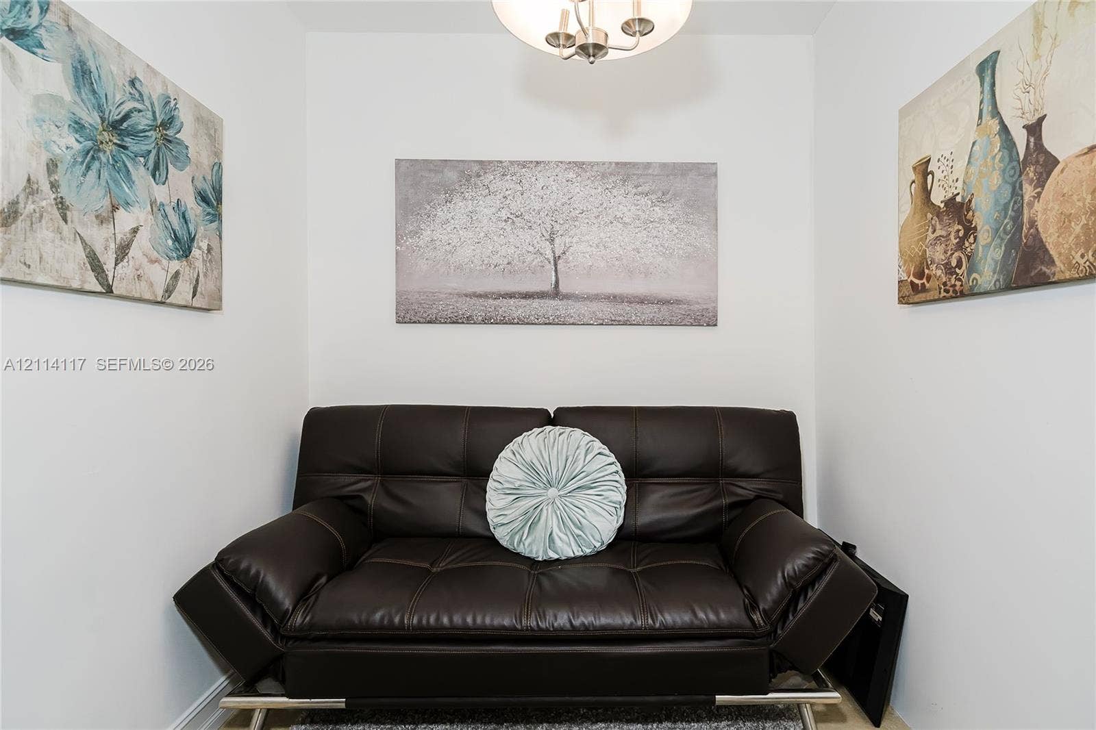 1850 S Ocean Drive, #4008, Hallandale Beach, Hallandale Beach, FL 33009 Neutral interior room featuring a three-arm overhead ceiling fixture with metallic finish