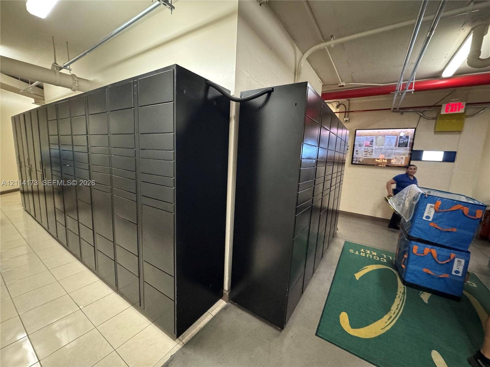 701 Brickell Key Boulevard, #1012, Miami, FL 33131 Automated parcel locker system with modular storage compartments and tile flooring