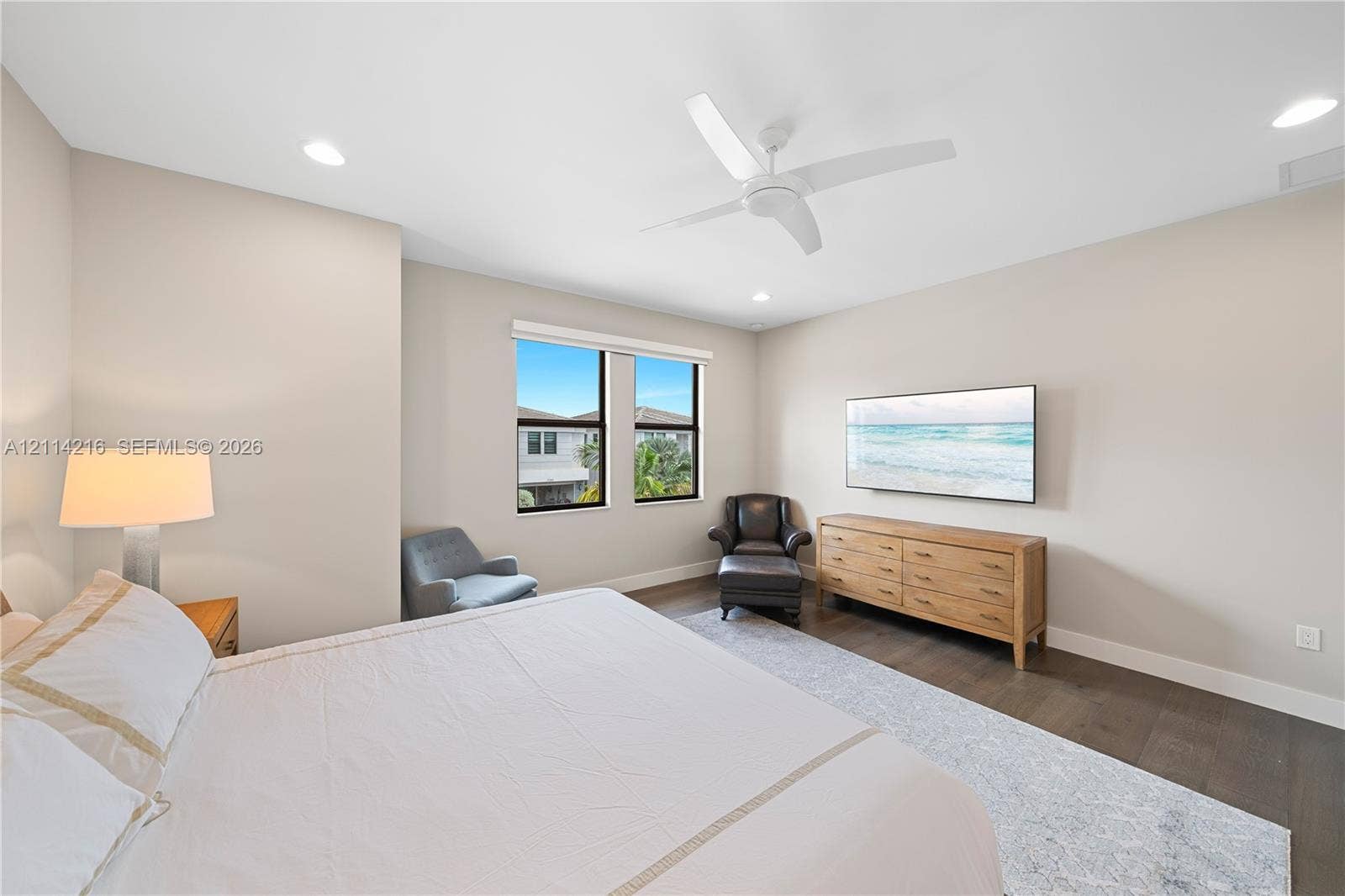 17085 Teton River Road, Boca Raton, FL 33496 Neutral-toned interior featuring dark wood-finish flooring, recessed lighting, and a white ceiling fan