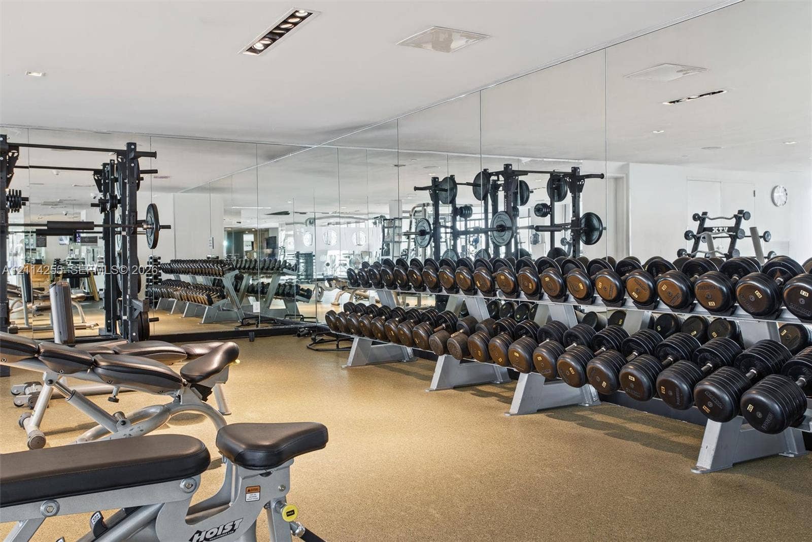 900 Biscayne Boulevard, #1705, Miami, FL 33132 Fitness center featuring full-wall mirrors, recessed lighting, and durable rubberized flooring