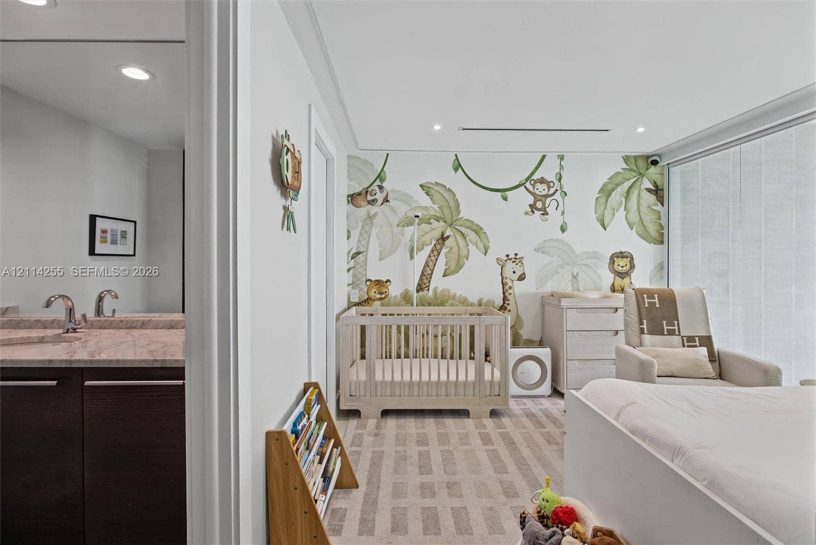 900 Biscayne Boulevard, #1705, Miami, FL 33132 Room featuring floor-to-ceiling windows, custom wall mural, recessed lighting, and wall-to-wall carpeting
