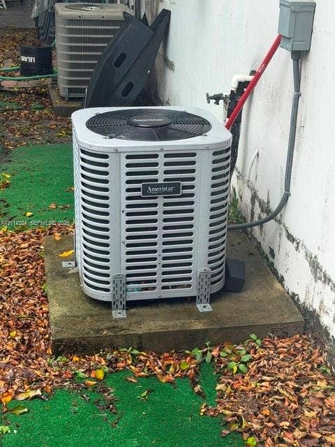 2312 Van Buren Street, #10, Hollywood, FL 33020 Ameristar exterior HVAC condenser unit mounted on a concrete pad