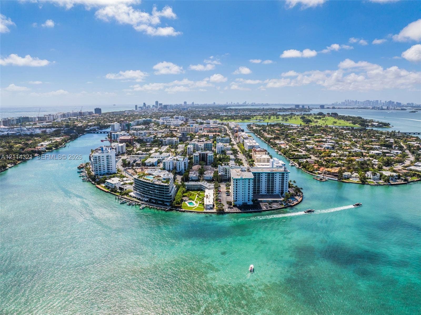 10350 W Bay Harbor Drive, #9C, Bay Harbor Islands, FL 33154 Aerial perspective of waterfront peninsula featuring coastal architecture, surrounding maritime waterways, and prominent shoreline positioning