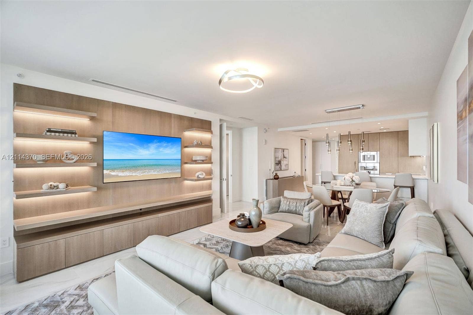 Sunny Isles Beach, Sunny Isles Beach, FL 33160 Custom wood-finish cabinetry, floor-to-ceiling built-in shelving with integrated LED lighting, recessed ceiling lighting, and smooth-finish flooring