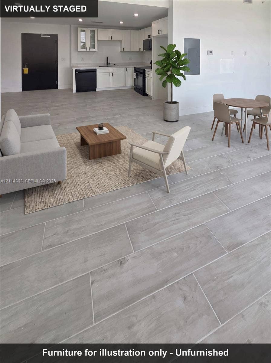 401 Pembroke Road, #202, Hallandale Beach, Hallandale Beach, FL 33009 Kitchen featuring white shaker-style cabinetry, recessed ceiling lighting, and porcelain tile flooring with a wood-finish aesthetic