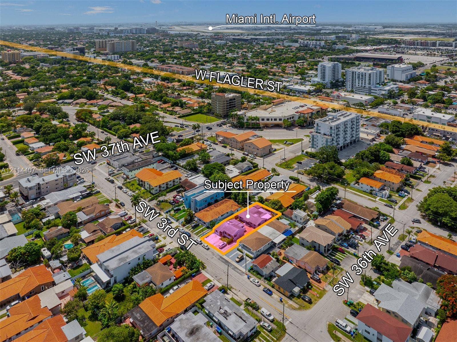 Aerial perspective of the subject property situated at the intersection of SW 3rd St and SW 36th Ave, featuring proximity to W Flagler St and established urban infrastructure