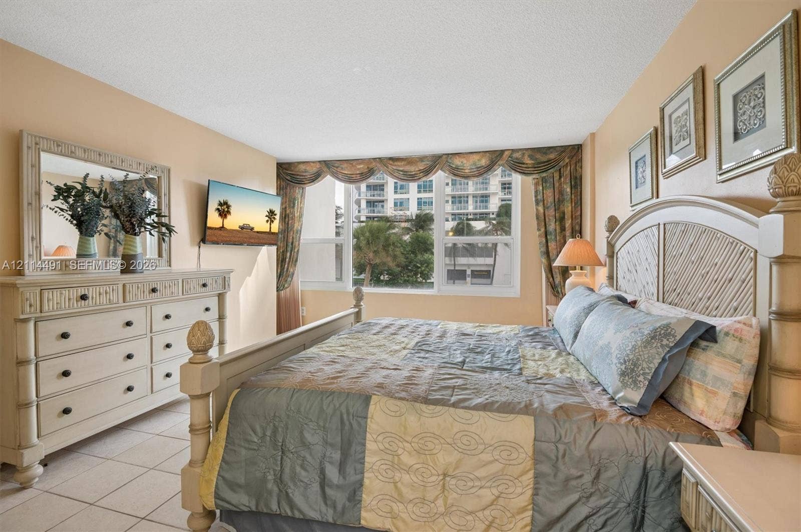 3505 S Ocean Drive, #217, Hollywood, FL 33019 Bedroom featuring large windows, neutral wall paint, and ceramic tile flooring
