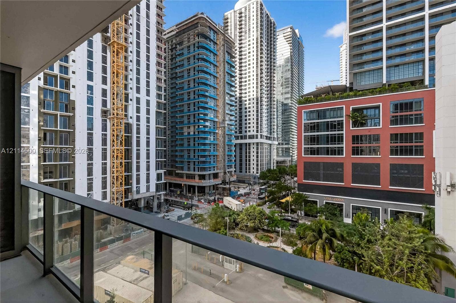 121 NE 5th Street, #712B, Miami, FL 33132 Private balcony featuring a dark metal railing and tempered glass panels