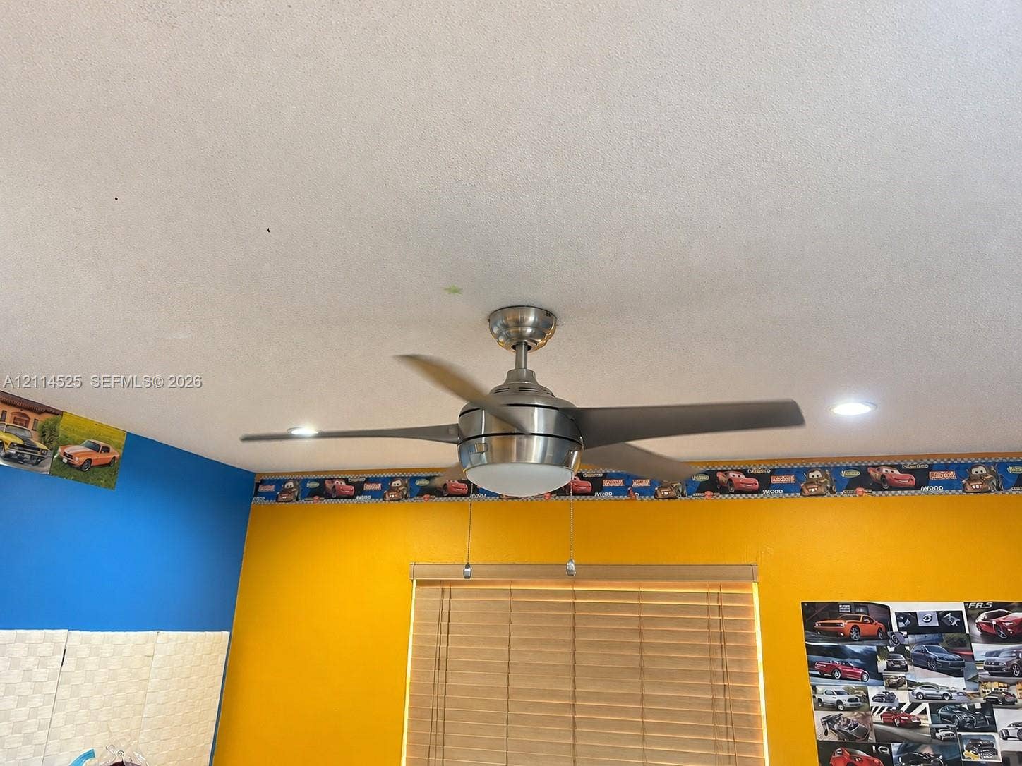 18905 SW 313th Terrace, Homestead, FL 33030 Brushed nickel ceiling fan with integrated light fixture and recessed lighting