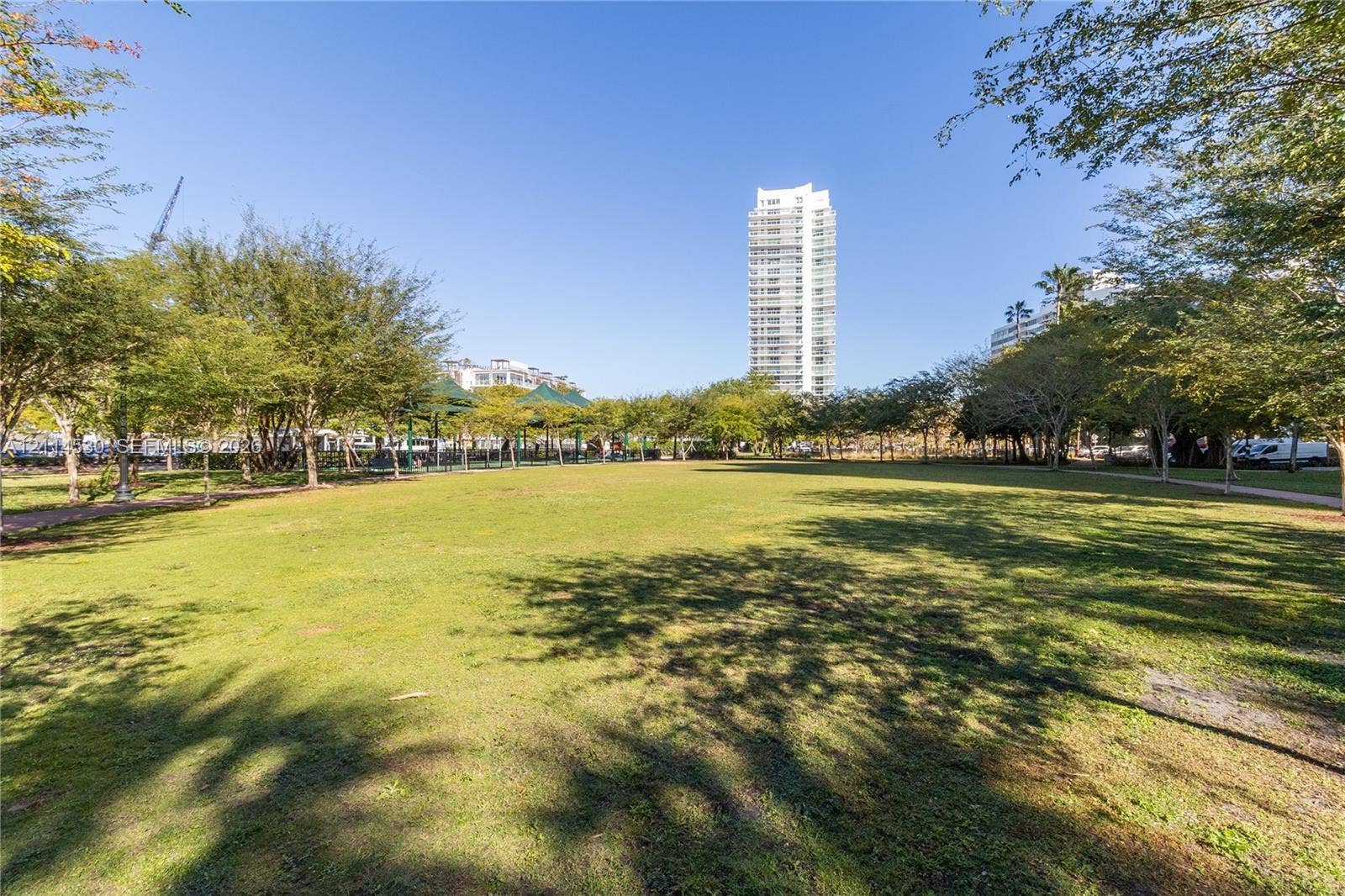 3 Island Avenue, #14L, Miami Beach, FL 33139 Expansive green space featuring mature trees and paved pedestrian paths