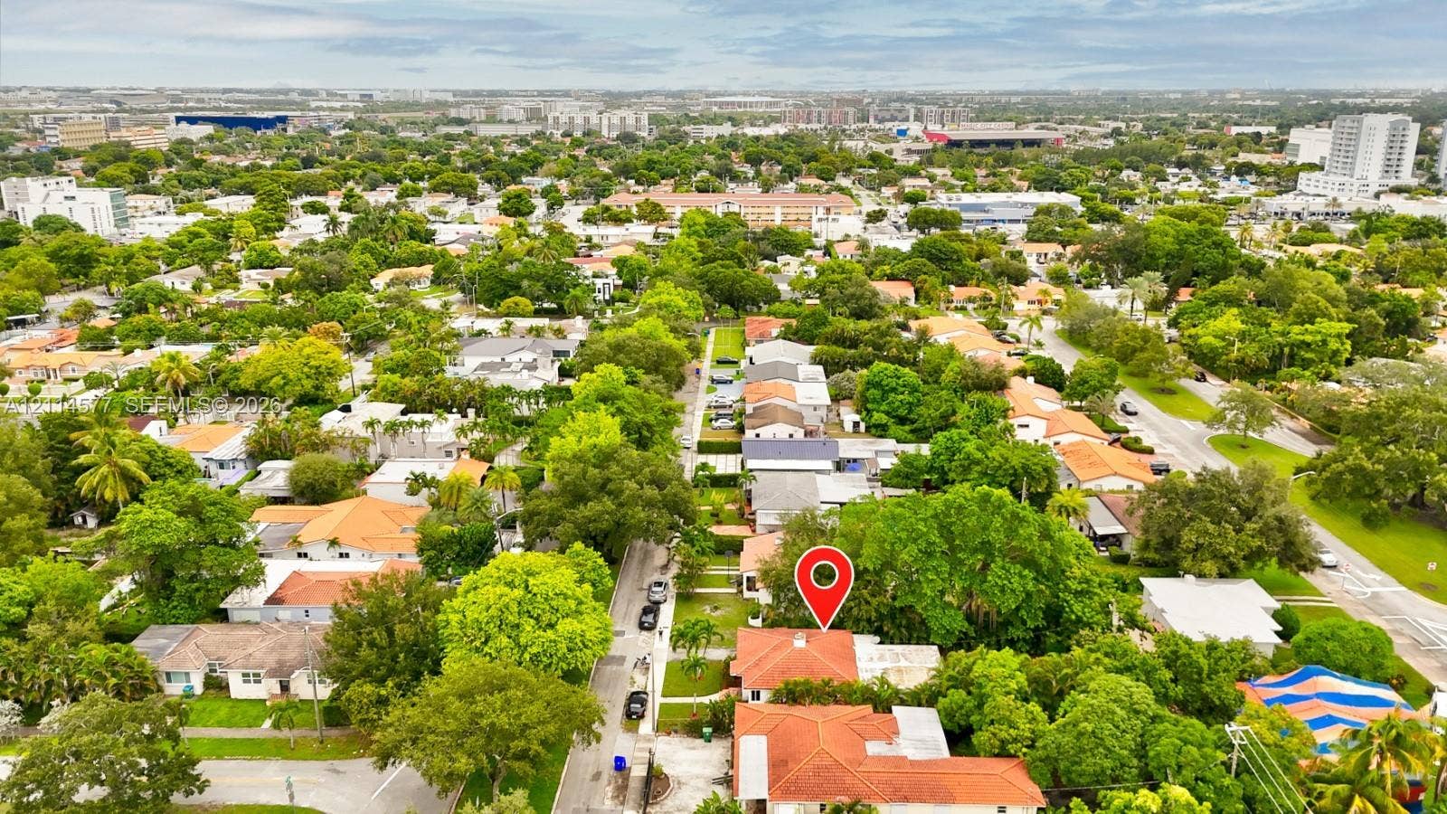 311 SW 38th Court, #0, Miami, Miami, FL 33134 Aerial perspective featuring mature trees, paved streets, and residential density in the surrounding area
