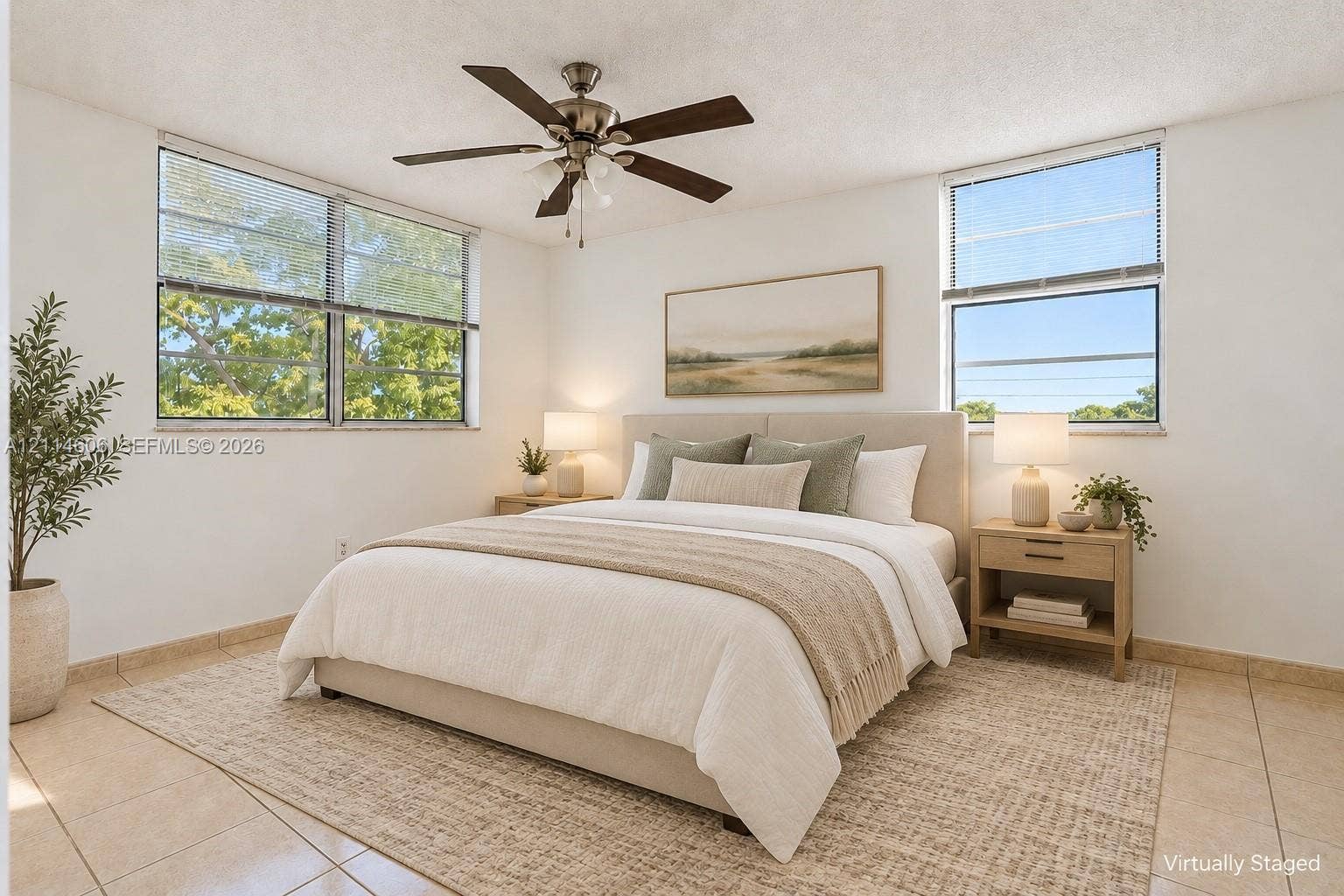 14155 SW 87th Street, #404-E, Miami, FL 33183 Neutral-toned tile flooring, multi-pane windows, and a multi-blade ceiling fan with integrated lighting
