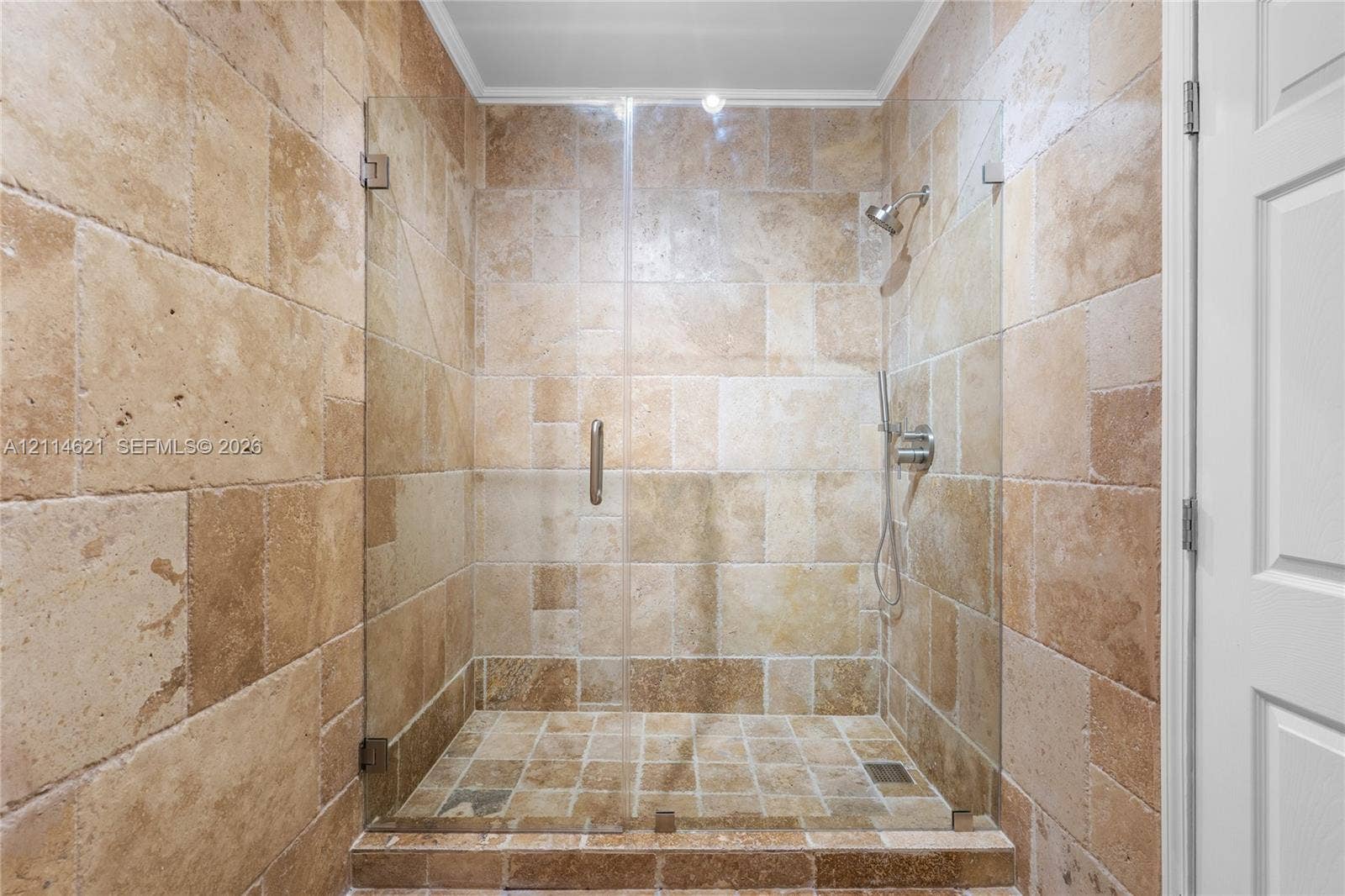 8978 NW 152nd Lane, #8978, Miami Lakes, Miami Lakes, FL 33018 Walk-in shower featuring natural stone tile surround, frameless glass door, handheld shower head, and recessed ceiling lighting