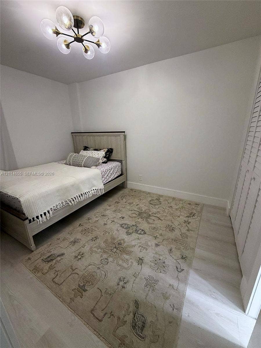 3301 N Country Club Drive, #507, Aventura, Aventura, FL 33180 Neutral interior featuring light wood-finish flooring and white walls