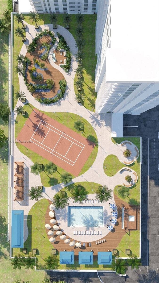 Aerial view of the exterior grounds featuring a swimming pool, landscaped walking paths, wood-finish decking, and built-in circular seating areas