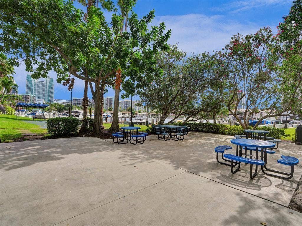 2500 Parkview Drive, #811, Hallandale Beach, Hallandale Beach, FL 33009 Paved outdoor common area featuring mature shade trees and manicured lawn space