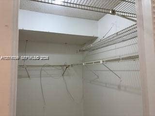 2500 Parkview Drive, #811, Hallandale Beach, Hallandale Beach, FL 33009 Storage closet featuring white interior walls and multi-level ventilated wire shelving