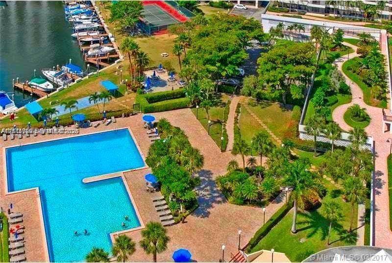 2500 Parkview Drive, #811, Hallandale Beach, Hallandale Beach, FL 33009 Communal swimming pool, tennis court, boat slips, landscaped grounds, and paved walking paths